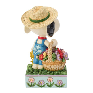 Jim Shore Peanuts: Snoopy Holding Flower Basket Figurine
