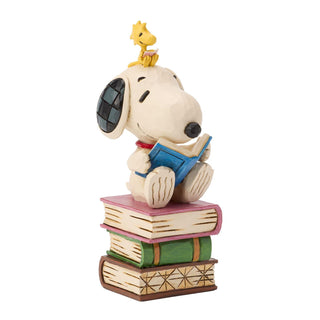 Jim Shore Peanuts: Snoopy Reading on Stacked Book Figurine