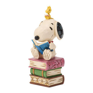 Jim Shore Peanuts: Snoopy Reading on Stacked Book Figurine