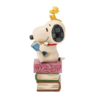 Jim Shore Peanuts: Snoopy Reading on Stacked Book Figurine