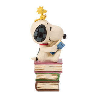 Jim Shore Peanuts: Snoopy Reading on Stacked Book Figurine