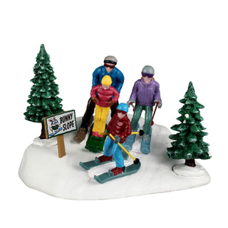 Lemax Vail Village Accessory: Family Ski Day sparkle-castle