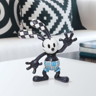 Jim Shore Disney Traditions: Mini Oswald Figurine sparkle-castle