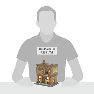Department 56 Christmas in the City Village: Thompson's Furniture sparkle-castle