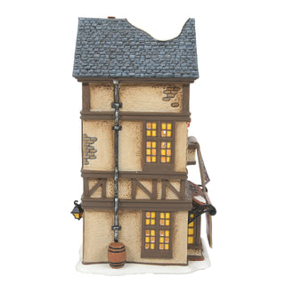 Department 56 Dickens Village: Kingsford Rug Merchant sparkle-castle