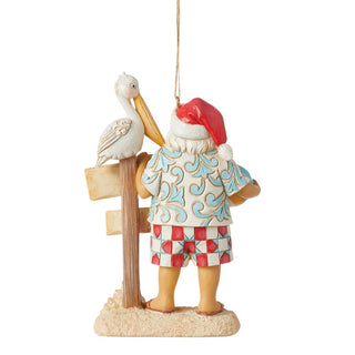 Jim Shore Heartwood Creek: Coastal Santa with Sign and Pelican Hanging Ornament sparkle-castle