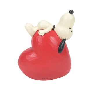 Jim Shore Peanuts: Snoopy Laying On Heart Figurine sparkle-castle