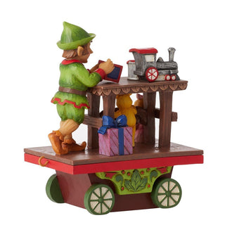 Jim Shore Heartwood Creek: Elf with Toys Train Car Figurine sparkle-castle