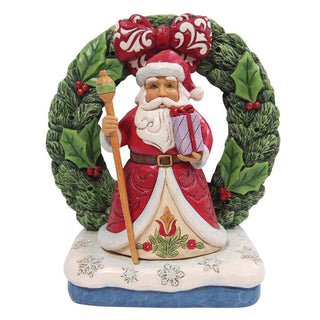 Jim Shore Heartwood Creek: Santa by Light Up Wreath Figurine sparkle-castle