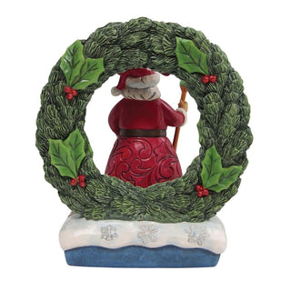 Jim Shore Heartwood Creek: Santa by Light Up Wreath Figurine sparkle-castle