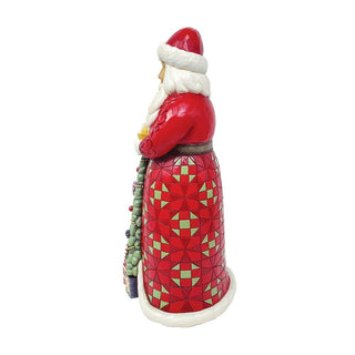 Jim Shore Heartwood Creek: Santa with Christmas Tree Coat Figurine sparkle-castle