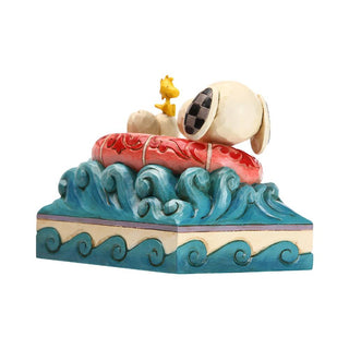 Jim Shore Peanuts: Snoopy Woodstock Floatie Figurine sparkle-castle