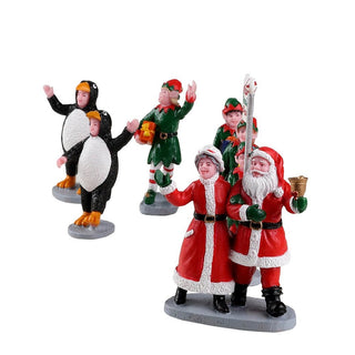 Lemax Caddington Village Accessory: Santa's Elf Parade, Set of 7 sparkle-castle